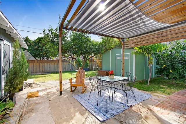 view of patio featuring a storage shed