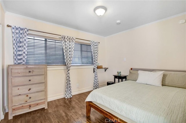 bedroom with dark wood-type flooring and crown molding