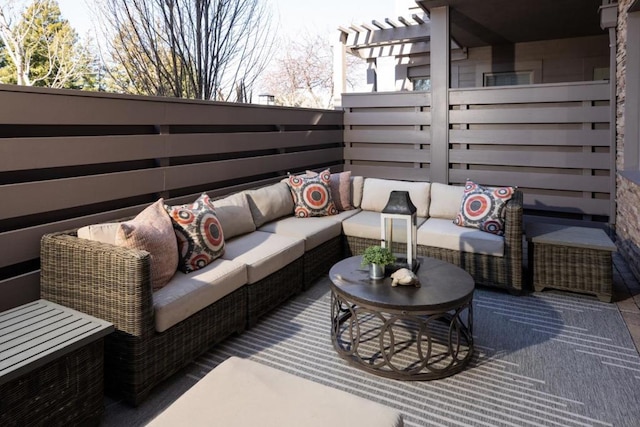 wooden deck with an outdoor hangout area