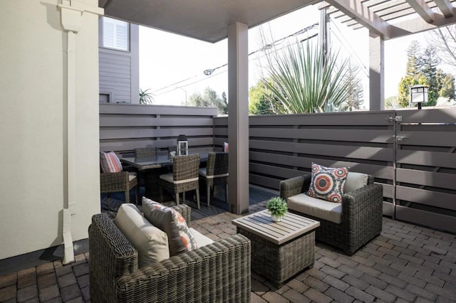 view of patio with outdoor lounge area and a pergola