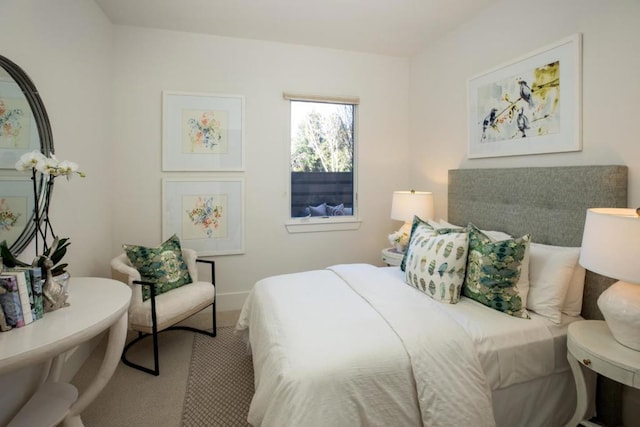 bedroom featuring carpet flooring