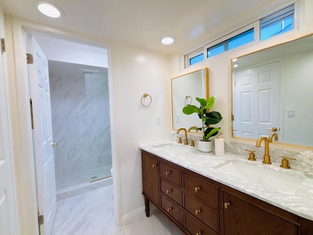 bathroom featuring vanity and a tile shower