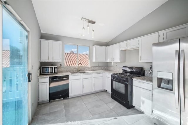 kitchen with vaulted ceiling, light tile patterned flooring, sink, white cabinets, and black appliances