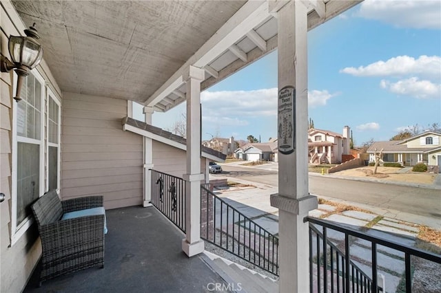 balcony featuring covered porch