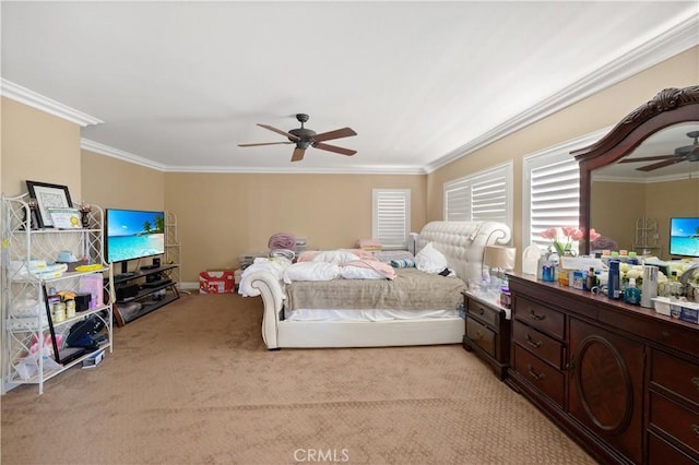 carpeted bedroom featuring crown molding and ceiling fan