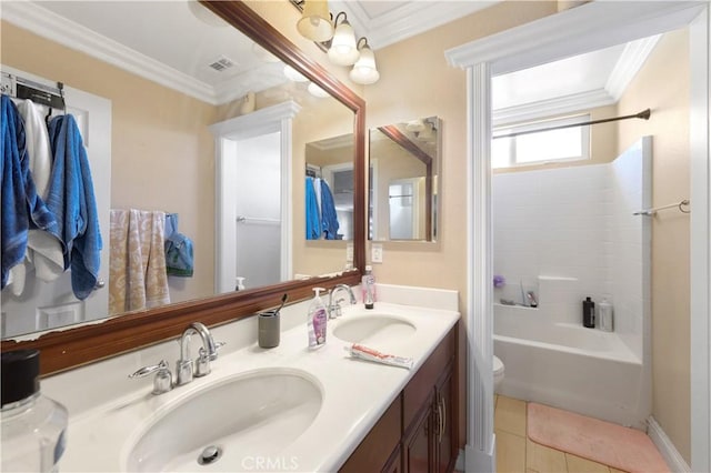 full bathroom with tile patterned flooring, vanity, crown molding, and shower / washtub combination