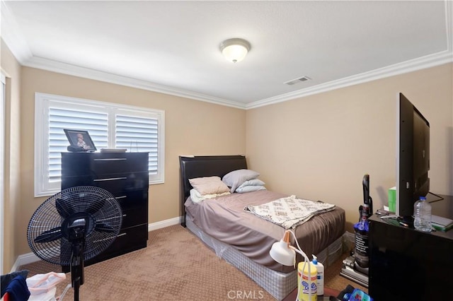 bedroom featuring crown molding and light colored carpet