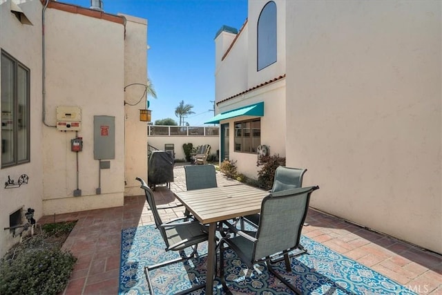 view of patio with outdoor dining area