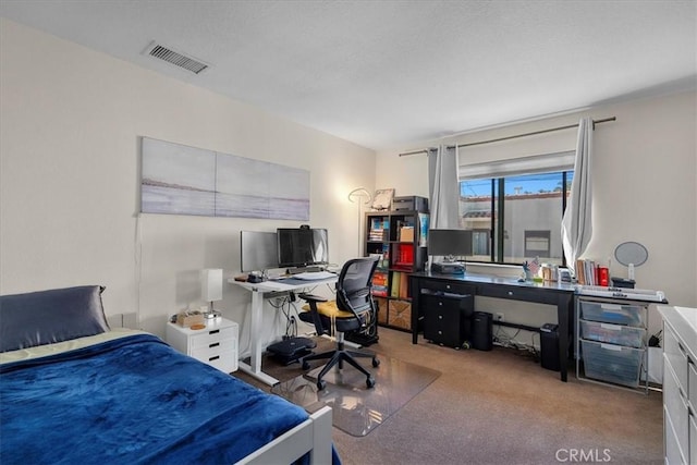 bedroom featuring light colored carpet and visible vents