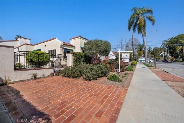 243 Park Ave, Long Beach, CA 90803 - view of patio featuring a fenced front yard and a gate