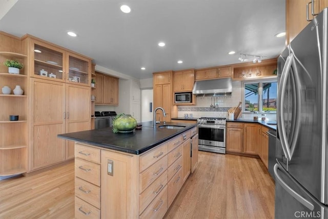 243 Park Ave, Long Beach, CA 90803 - kitchen featuring stainless steel appliances, open shelves, a sink, under cabinet range hood, and dark countertops