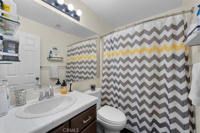 243 Park Ave, Long Beach, CA 90803 - full bathroom featuring vanity, toilet, and a shower with shower curtain