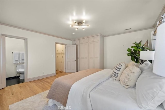 243 Park Ave, Long Beach, CA 90803 - bedroom with light wood-style floors, ornamental molding, baseboards, and ensuite bath