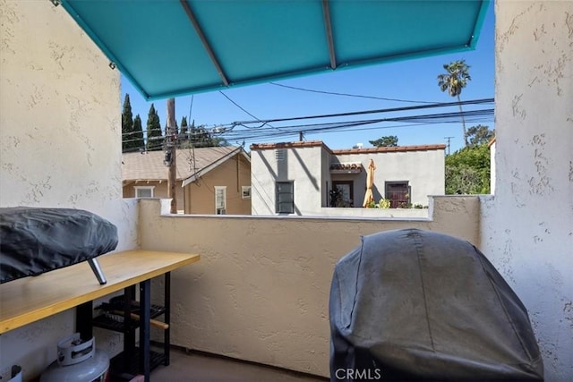 243 Park Ave, Long Beach, CA 90803 - view of patio featuring a balcony and a grill