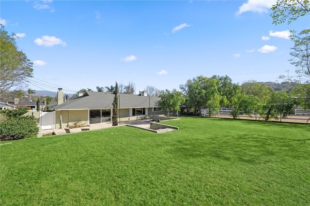 view of yard featuring a patio