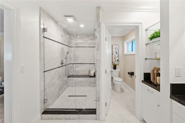 bathroom featuring vanity, a shower with shower door, tile patterned floors, and toilet