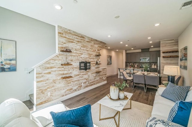 living room with dark hardwood / wood-style floors