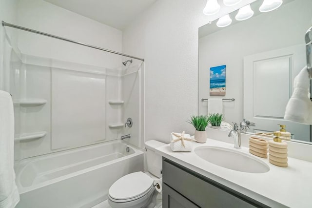 full bathroom featuring vanity,  shower combination, and toilet