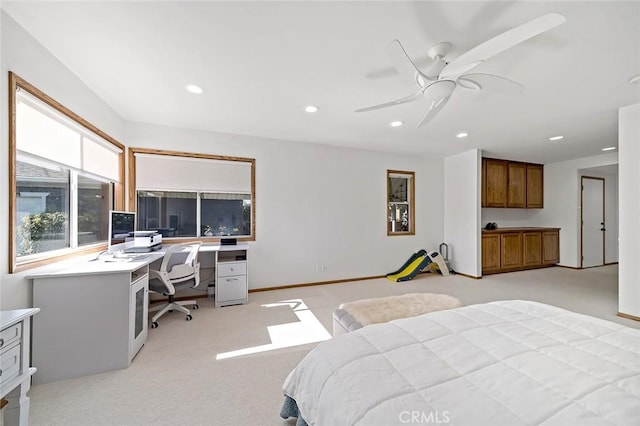 carpeted bedroom with ceiling fan