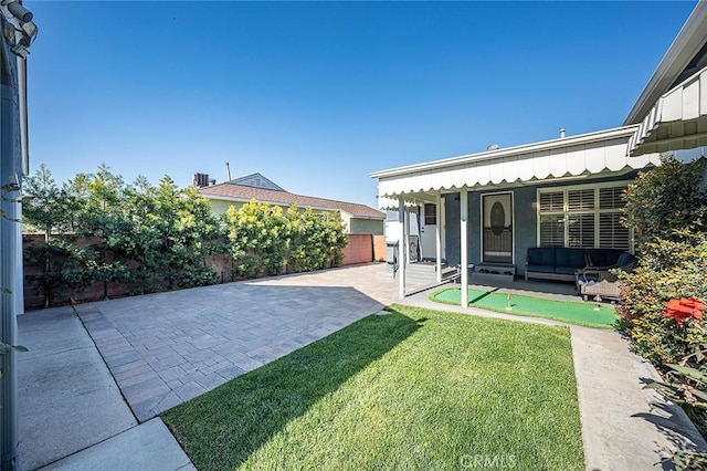 view of yard with a patio area