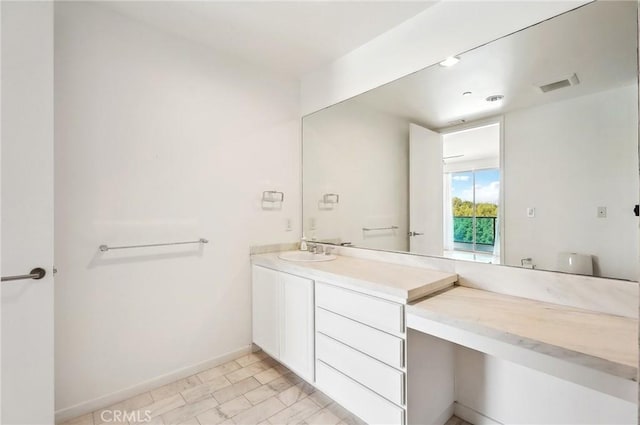 bathroom featuring vanity