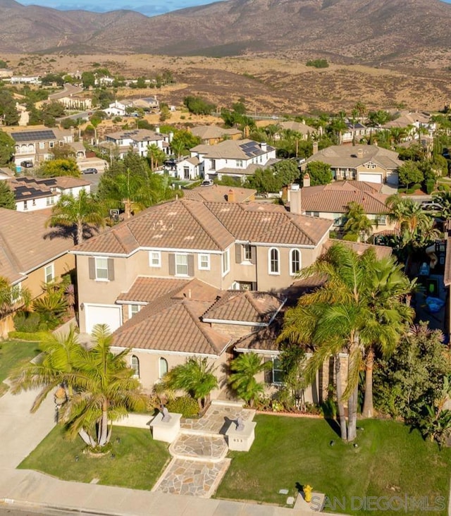 drone / aerial view featuring a mountain view