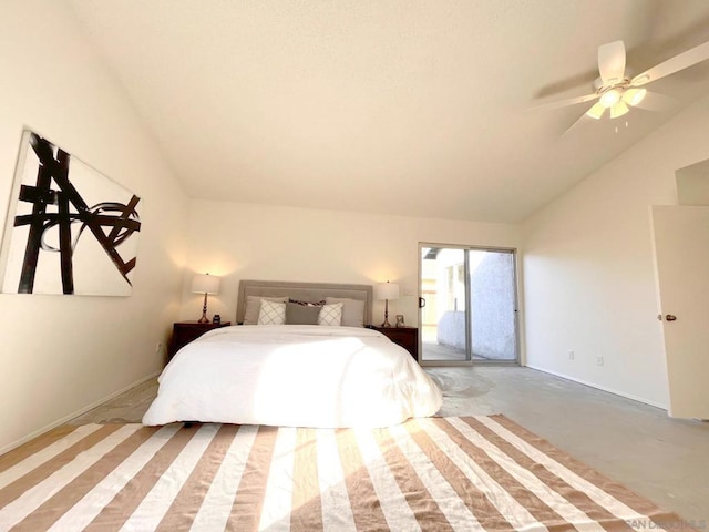 bedroom featuring ceiling fan, vaulted ceiling, concrete floors, and access to outside