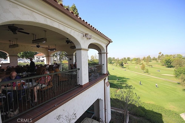 exterior space featuring ceiling fan