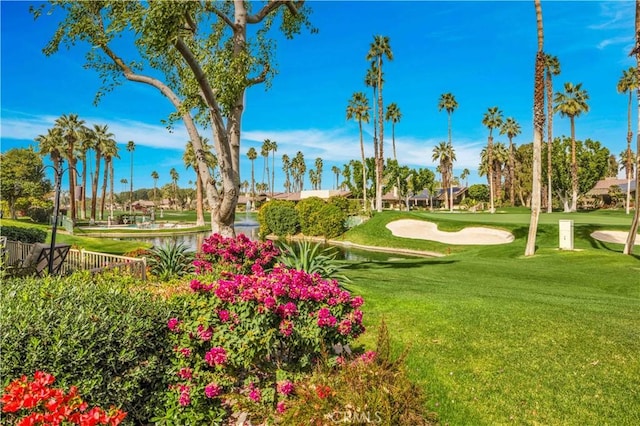 266 Running Springs Dr, Palm Desert, CA 92211 - surrounding community with golf course view and a yard