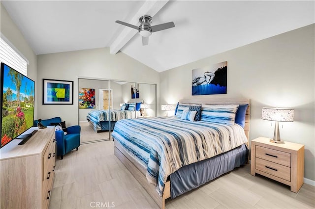 bedroom featuring lofted ceiling with beams and ceiling fan