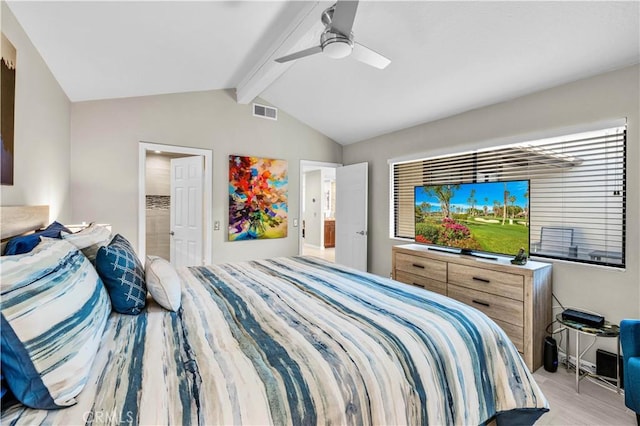 bedroom featuring connected bathroom, lofted ceiling with beams, ceiling fan, and light wood-type flooring