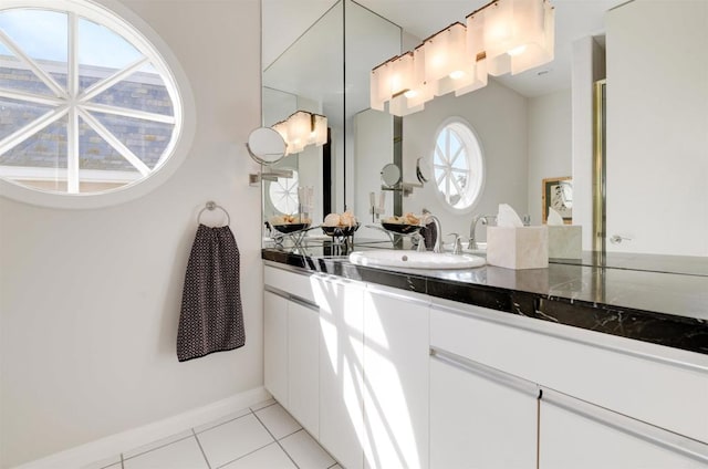 7487 Via De Fortuna, Carlsbad, CA 92009 - bathroom featuring tile patterned flooring, vanity, and baseboards