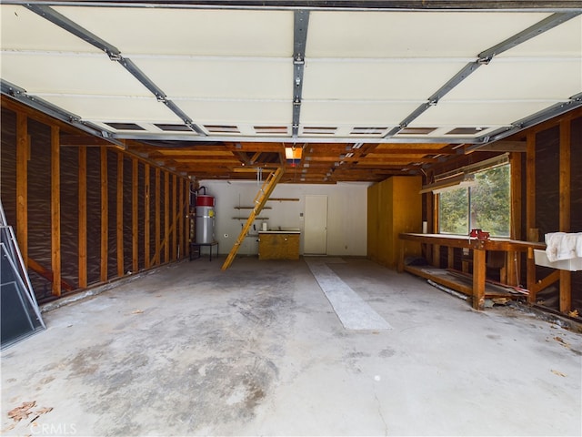 garage with strapped water heater