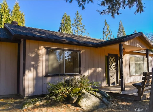 doorway to property featuring a wooden deck