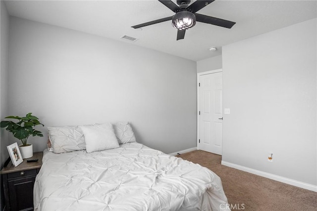 carpeted bedroom featuring ceiling fan