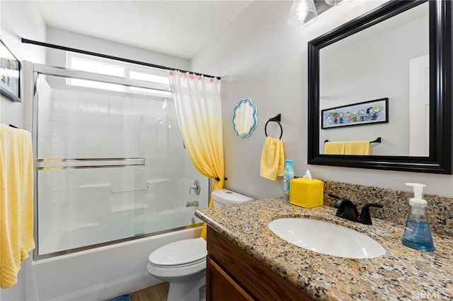 full bathroom with shower / tub combo, vanity, and toilet