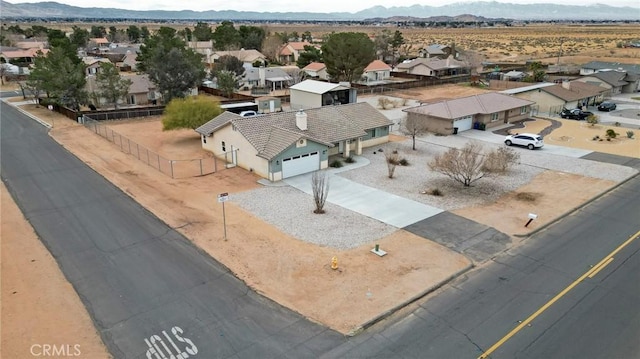 drone / aerial view featuring a mountain view