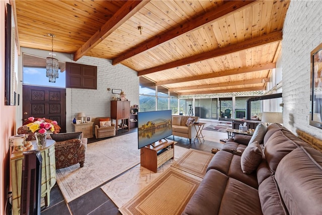 living room with wood ceiling, brick wall, a chandelier, and vaulted ceiling with beams