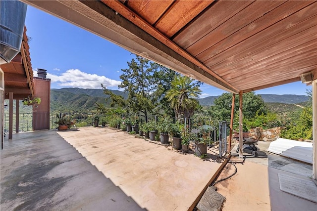 view of patio with a mountain view