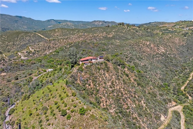 drone / aerial view featuring a mountain view