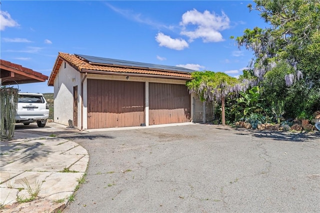 garage with solar panels