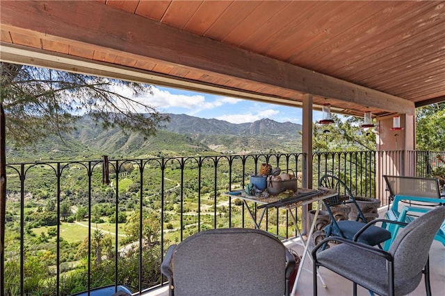 balcony featuring a mountain view