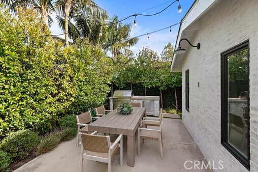 view of patio featuring area for grilling and exterior kitchen