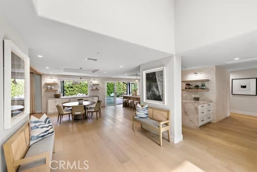 living room with light hardwood / wood-style flooring