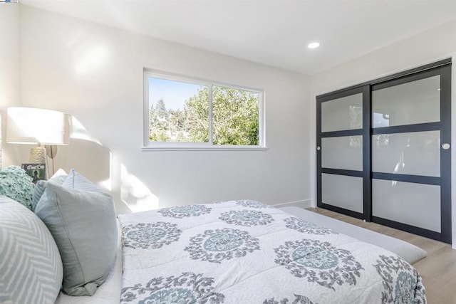 bedroom featuring light hardwood / wood-style flooring