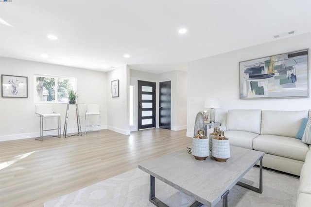 living room featuring light wood-type flooring