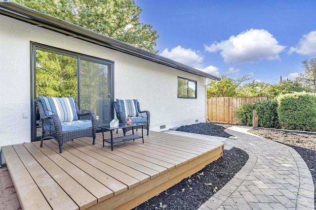 exterior space featuring an outdoor hangout area and a deck