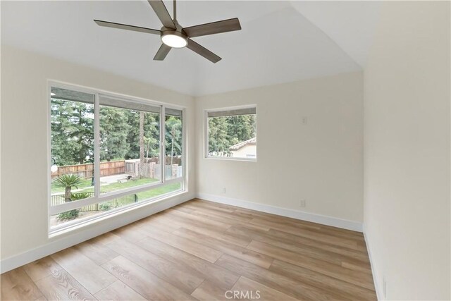 6054 N Woodson Ave, Fresno, CA 93711 - unfurnished room with light wood-style flooring, a ceiling fan, and baseboards