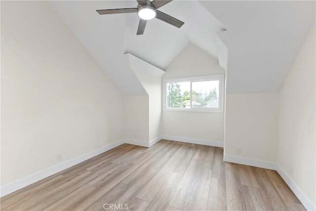 6054 N Woodson Ave, Fresno, CA 93711 - additional living space featuring light wood finished floors, a ceiling fan, baseboards, and vaulted ceiling
