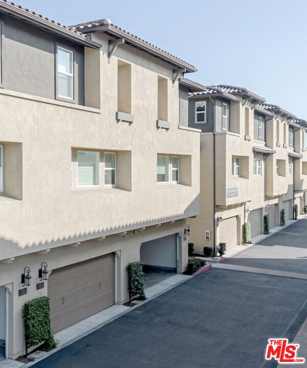 view of property featuring a garage